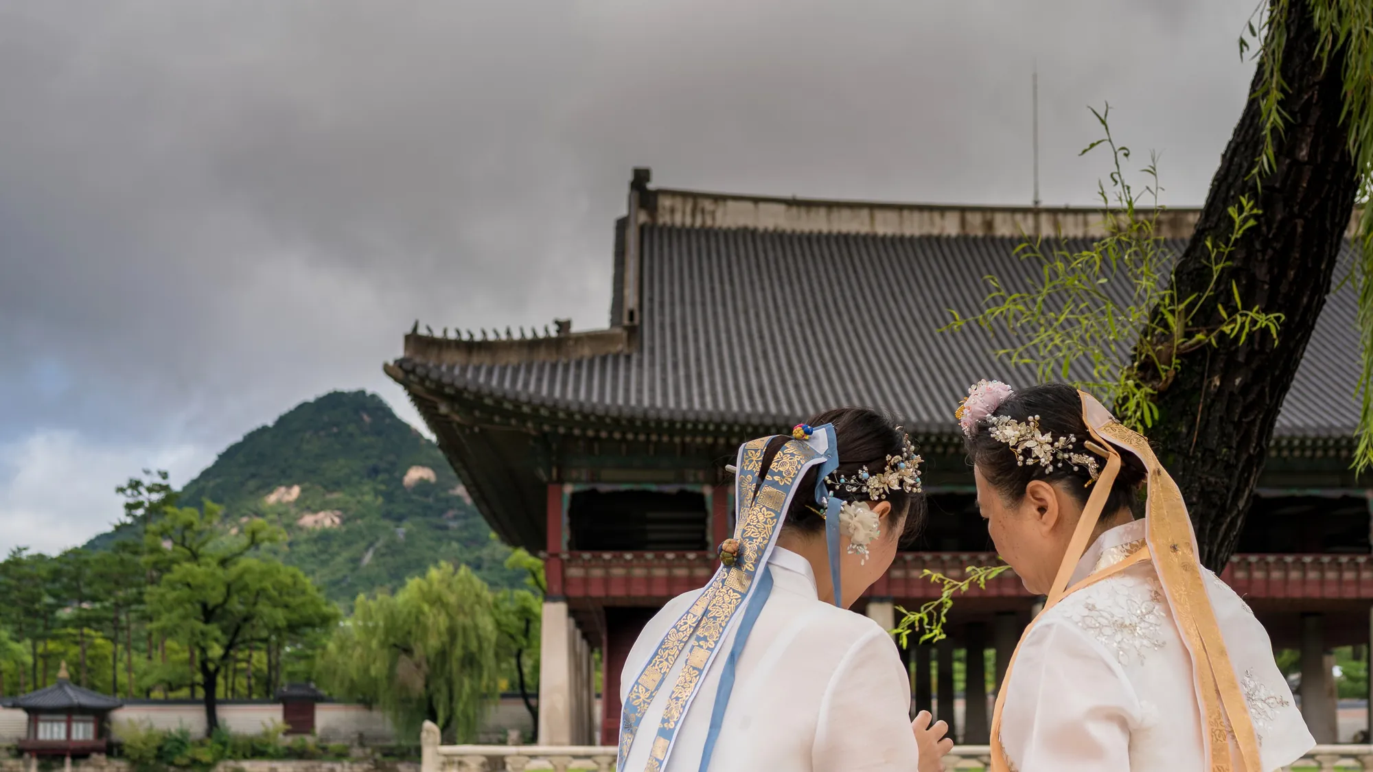 Visitors in hanbok at Gyeongbokgung palace, Seoul